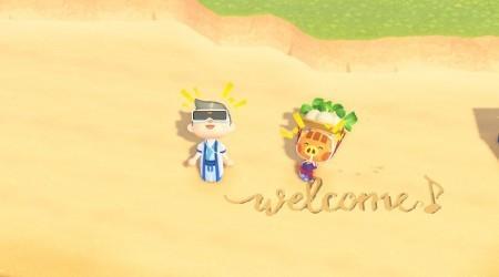 Message : "Welcome" sur le sable